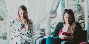 Women Browsing Cell Phones