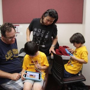 Students show their Scratch games to their parents (Photo/Reeves Gift)