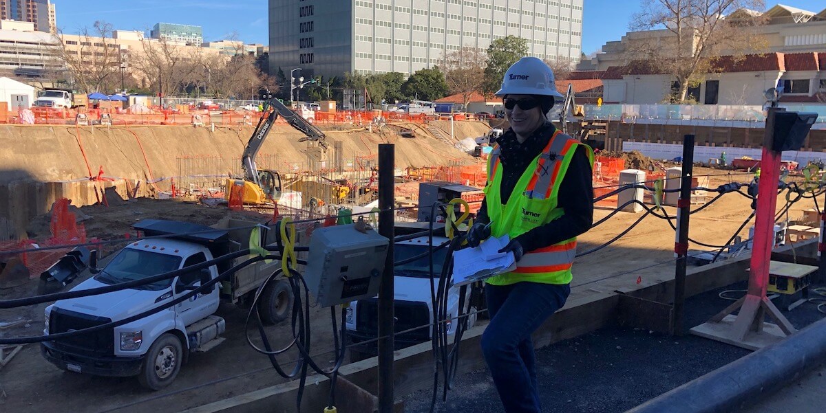 Lind conducting a concrete inspection, while a 500-yard pour was occurring. This was part of Lind's two-year internship with Turner Construction, at the New Natural Resources Headquarters in Sacramento, CA. PHOTO/JAIME HERRERA.