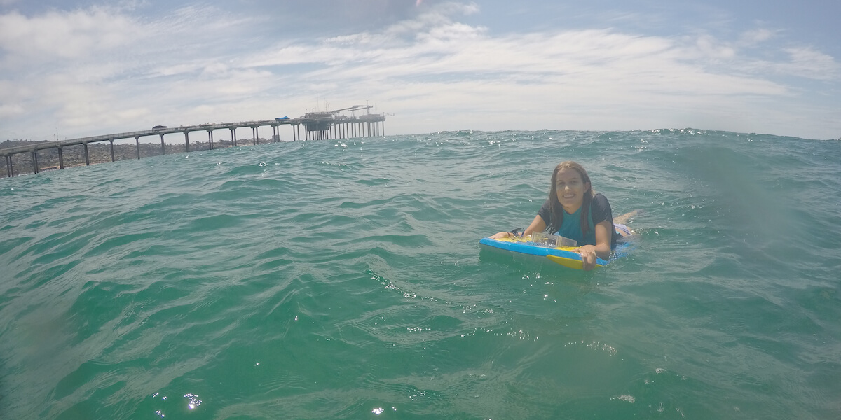 Hannah Walker modified a body board with an embedded waterproof sensor package to collect data about the ocean's underwater topography. (Photo/Courtesy of Hannah Walker)