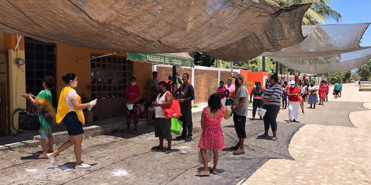 The relief effort provided meals for the community to help them through the devastating economic effects of COVID-19. Image Courtesy of Mendoza