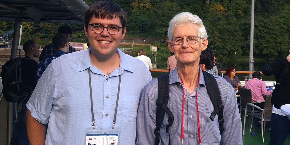A photograph of ISI's ISI computer scientist Fred Morstatter at the 2017 Heidelberg Laureate Forum with ACM Turing Award recipient Stephen Cook.