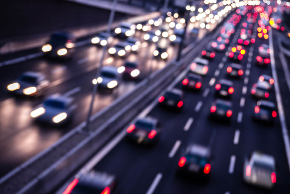 A photo of car traffic on a freeway