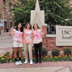 USC students in tie-dye T-shirts on USC University Park Campus.