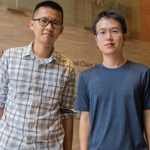 Professor Haipeng Luo (right) and Ph.D. student Chen-Yu Wei won best paper award at the Annual Conference on Learning Theory (COLT). Photo/Aaron John Balana.