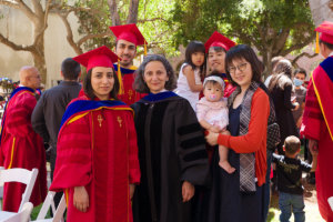 Professor Mahta Moghaddam with newly hooded Ph.D.s after the 2022 Ph.D. Hooding and Awards Ceremony.
