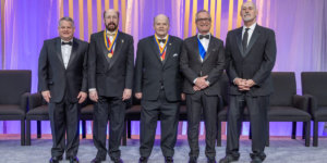 Paul Daniel Dapkus, center, received the award in Philadelphia in May 2022 (PHOTO CREDIT: The Franklin Institute)