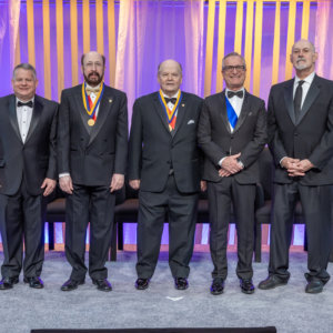 Paul Daniel Dapkus, center, received the award in Philadelphia in May 2022 (PHOTO CREDIT: The Franklin Institute)