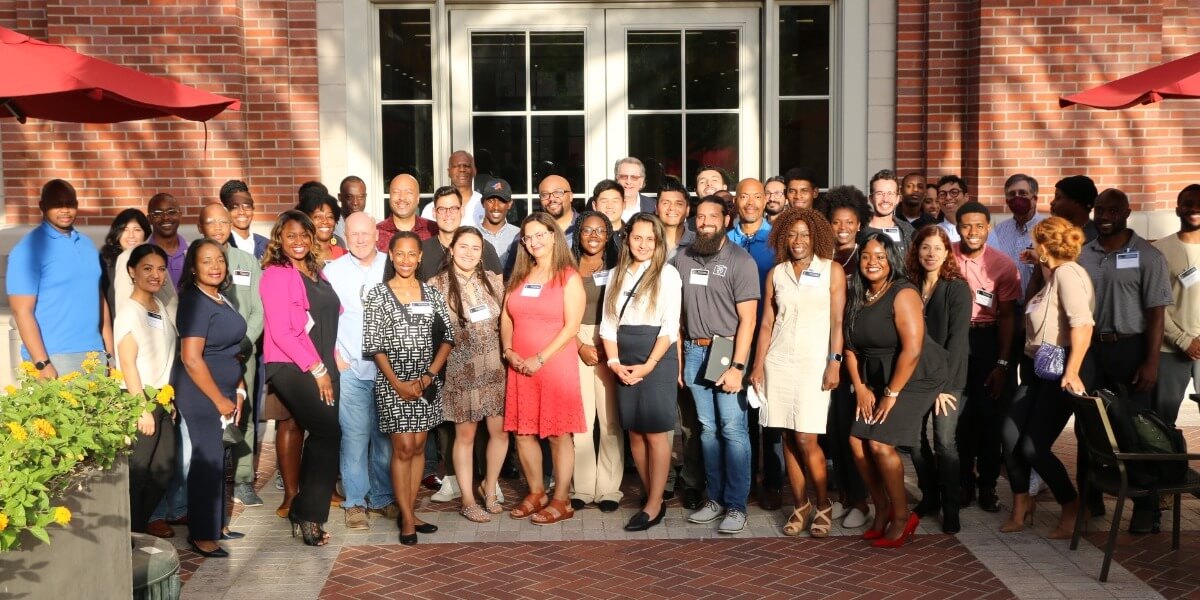 Stacyann Russell (front row right far right) pictured with I-Corps Hub participants and members of Gem Fellowship