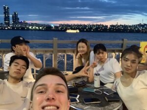 Adam Novak and friends enjoying dinner next to Han River in Seoul, South Korea in 2019 (Photo/Courtesy of Adam Novak)