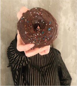 Cristina Zavaleta holding a donut
