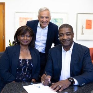 Michelle and Al Williams sign gift agreement with Dean Yannis Yortsos