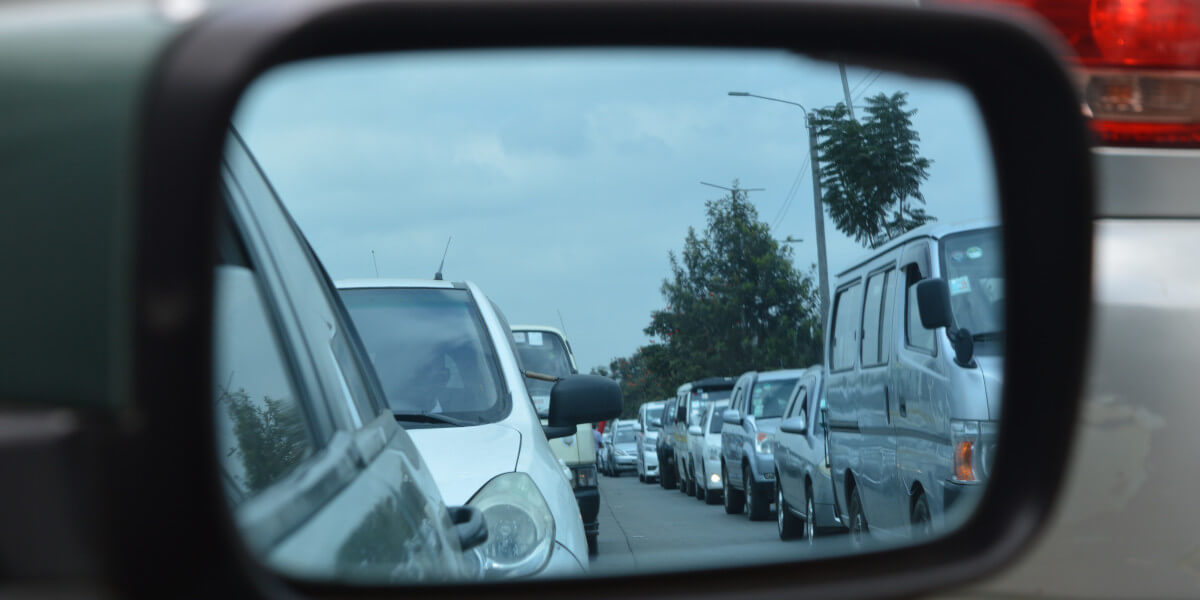 Traffic in rearview mirror
