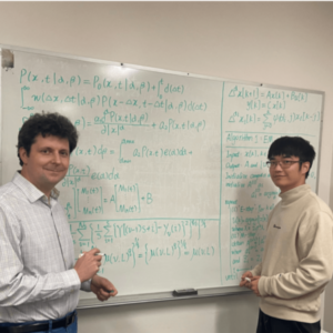 Paul Bogdan and Chenzhong Yin with a summary of their research (Photo/Courtesy of Paul Bogdan)