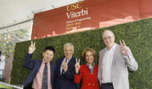Alfred E. Mann Department of Biomedical Engineering Chair Peter Yingxiao Wang, USC Viterbi Dean Yannis C. Yortsos, USC President Carol L. Folt and Michael Dreyer, trustee of the Alfred E. Mann Charities. Image/Steve Cohn