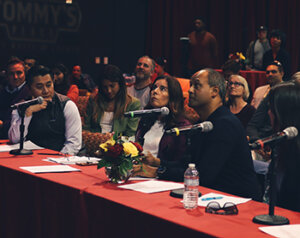 The panel of judges watch the presentations