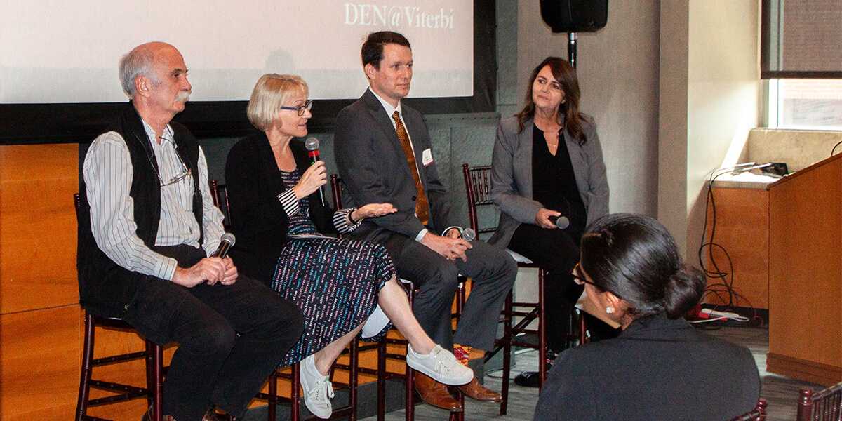 Mike Gruntman, professor of Astronautics, Trina Gregory, associate professor of Information Technology Practice, and Jonathan Messer, M.S. ’18, speaking during a panel moderated by Kelly Goulis, senior associate dean for admission and student engagement, at the DEN@Viterbi 50th anniversary event