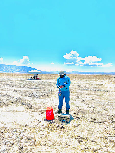 Assistant Professor Chukwuebuka C. Nweke, engaged in data collection for seismic site response at Searles Dry Lake, CA