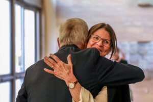 Dean Yannis C. Yortsos was surprised by his wife Sheryl and their children at the scholarship announcement. Image/Cooper Brown