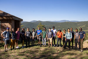 Interns and researchers at the National Renewable Energy Laboratory on a hike at Mount Falcon Park, CO