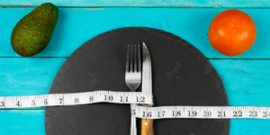 Photo of measuring tape wrapped around cutlery