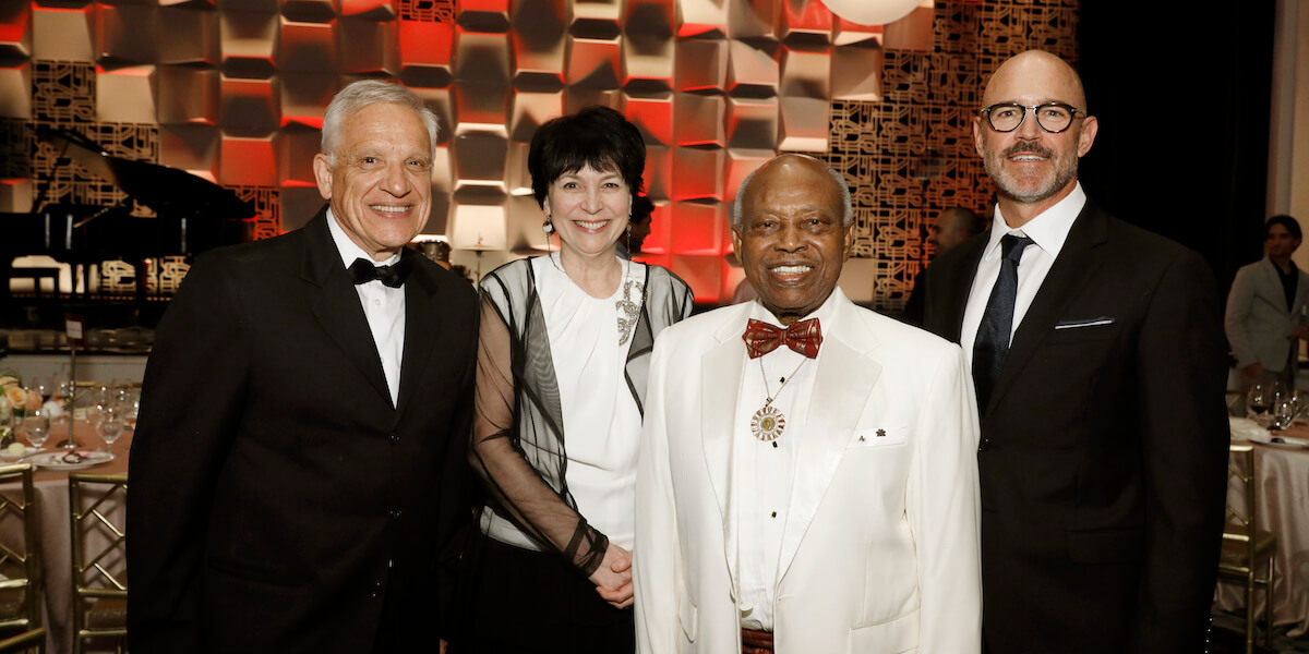 (Left to right) USC Viterbi Dean Yannis C. Yortsos with Viterbi Award winners Julie Brown, Augustine Esogbue, and William Holliday, president and CEO of The Charles Lee Powell Foundation (Photo/Steve Cohn)