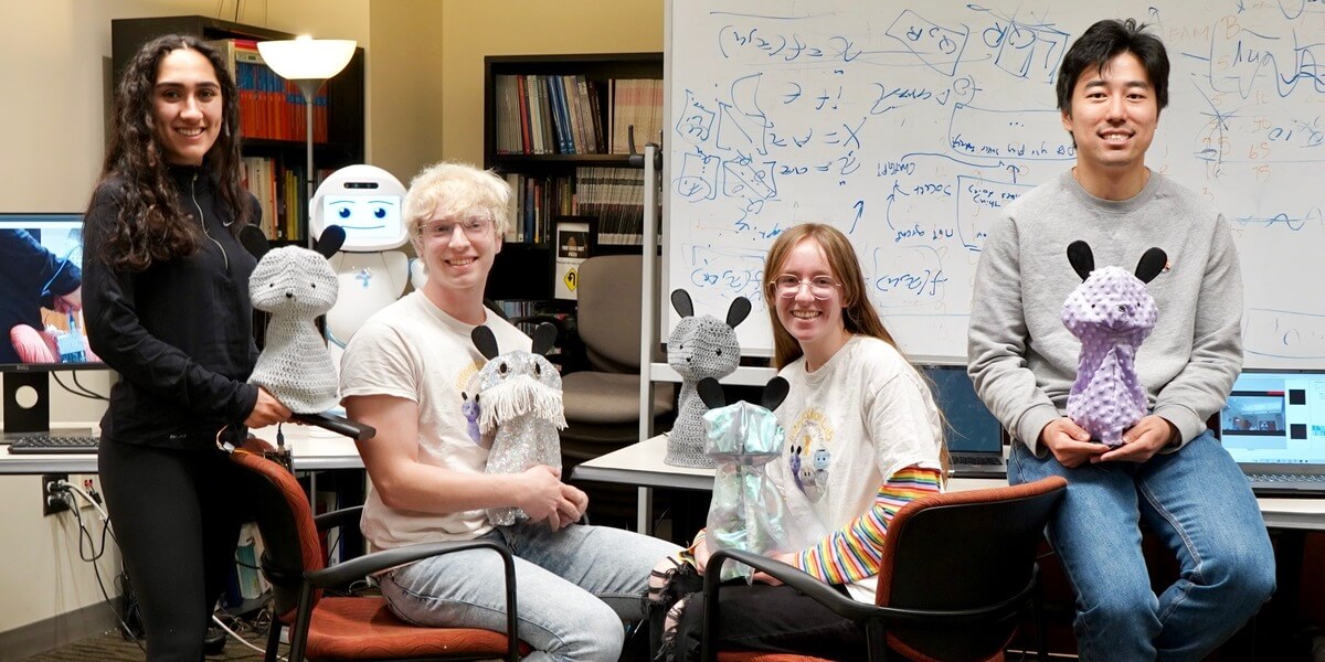 USC Viterbi Interaction Lab researchers introduce the Blossom robot to students