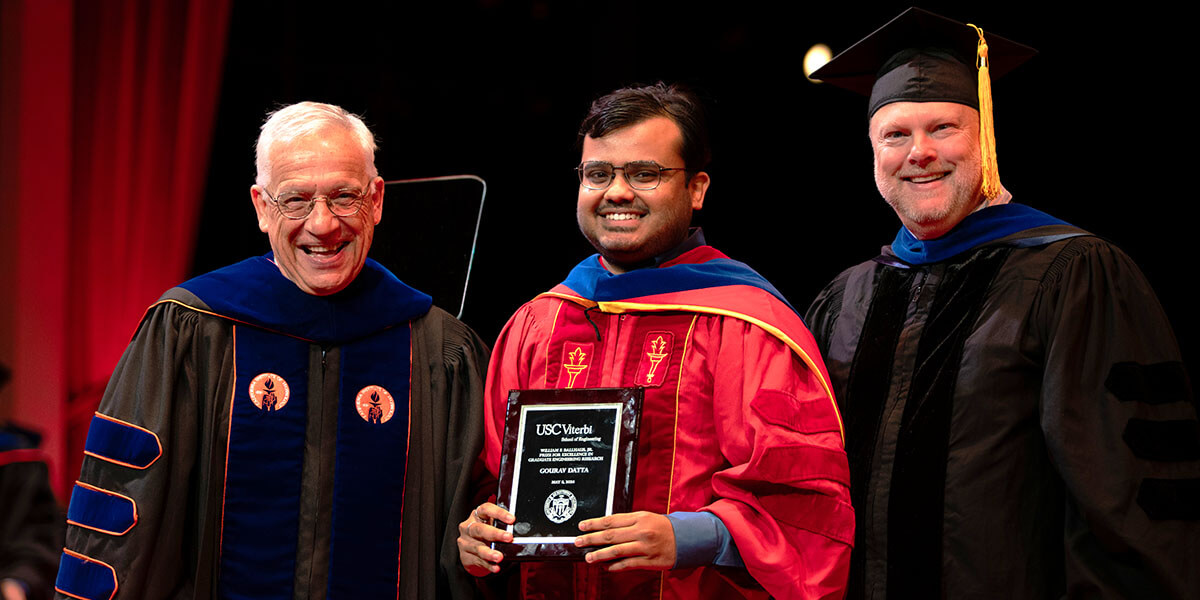 Gourav Datta, center, the winner of the 2024 William F. Ballhaus, Jr. Prize for Excellence in Graduate Engineering Research, with Dean Yannis Yortsos (left) and Erik Johnson, USC Viterbi vice dean for academic programs (right).