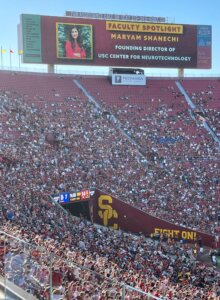A USC football game on Aug. 26, 2023, during which Dr. Maryam Shanechi was honored as the founding director of the new USC Center for Neurotechnology.