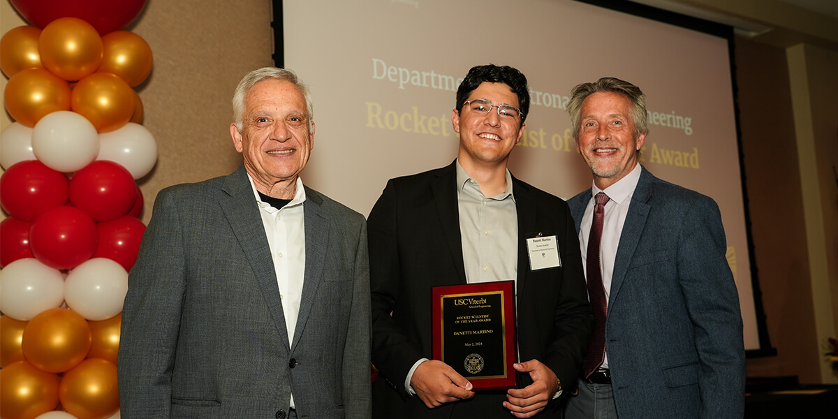 Danetti Martino receives the USC Viterbi Rocket Scientist of the Year Award. L-R: Dean Yannis Yortsos, Danetti Martino, Professor Dan Erwin