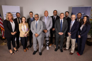 Representatives from California Dreams pose for a photo with U.S. national government officials before the Microelectronics Commons Announcement Event at ASU’s Macro Technology Works in Tempe on Sept. 17, 2024. (Photo by Samantha Chow/Arizona State University)