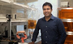 Photograph of Prof. Yasser Khan in his lab at USC. 