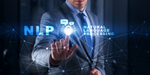 Image of man pressing screen that says NLP and natural language processing