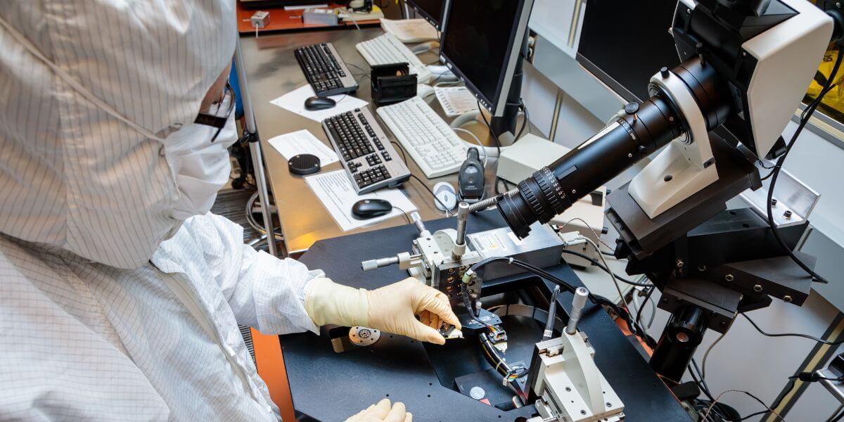 Photo of someone working in a cleanroom