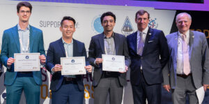 Ulubilge Ulusoy (center) with fellow finalists, IAF President Clay Mowry and IAF Executive Director Christian Feichtinger (Photo credit: IAF)