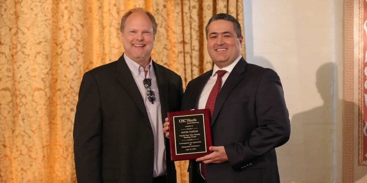 (Left to Right) Erik Johnson, Vice Dean for Academic Programs, and Navid Nastar (Photo/Dani Orlando)