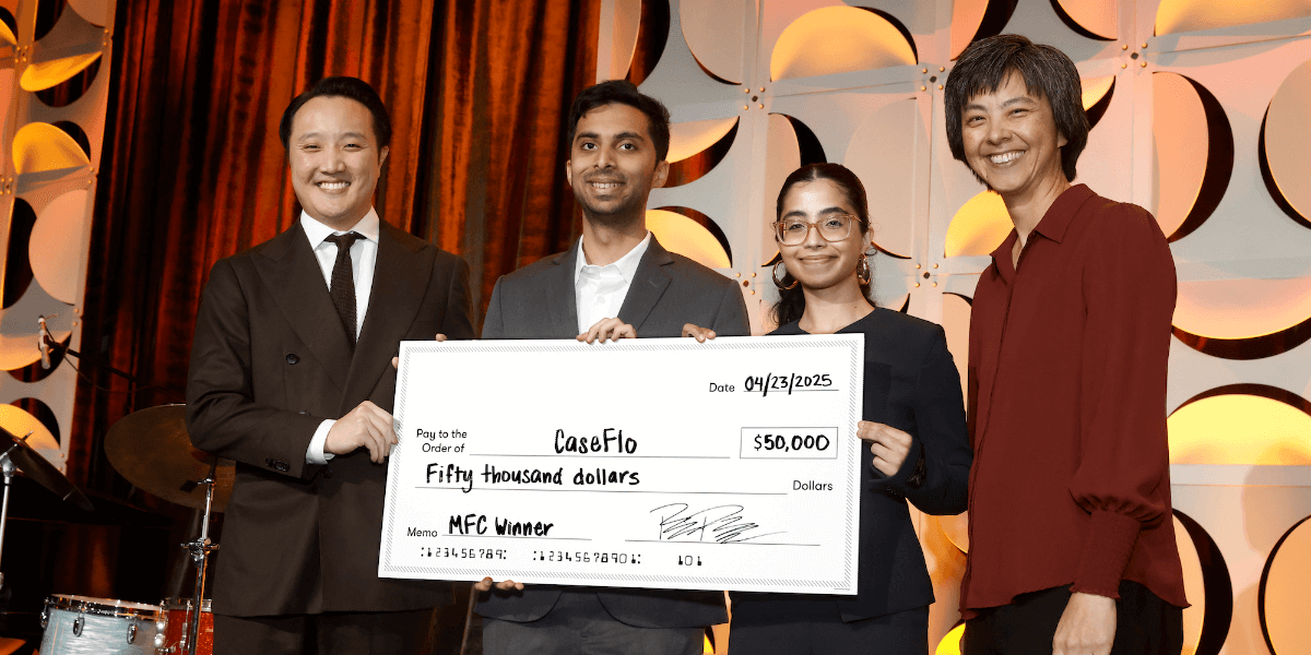 Image of a man in a brown suit and tie (Brandon Min) to the farthest left, a man (Aryan Gulati) in a gray blazer to the right of him, a woman (Jaspreet Ranjit) in glasses wearing a long sleeved black shirt to the right of him, and a woman (Ellis Meng) wearing a long sleeved dusty red top to the farthest right. Min, Gulati, and Ranjit are pictured each holding a large check addressed to Caseflo for fifty thousand dollars. All four individuals are pictured in front of an abstract background decorated with half-folded circles and long red drapes.