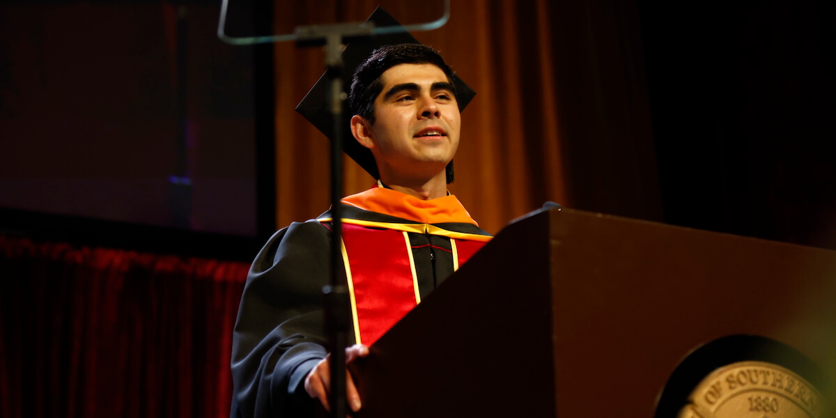 Student speaker at the first master's ceremony, Alek Yegazarian. Image/NoƩ Montes