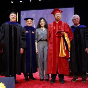 (Left to Right) Erik Johnson, Vice Dean for Academic Programs, Dean Yannis C. Yortsos, Professor Eva Kanso, Haotian Hang, winner of the William F. Ballhaus, Jr. Prize for Excellence in Graduate Engineering Research, and William Ballhaus, Jr. (Photo/Noe Montes)