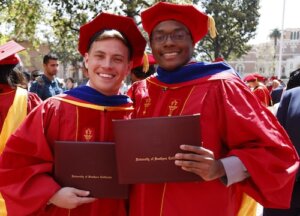 Ph.D. graduates celebrating (Photo/Noe Montes)