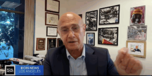 Prof Meshkati Screensot on KCAL news interview from his office