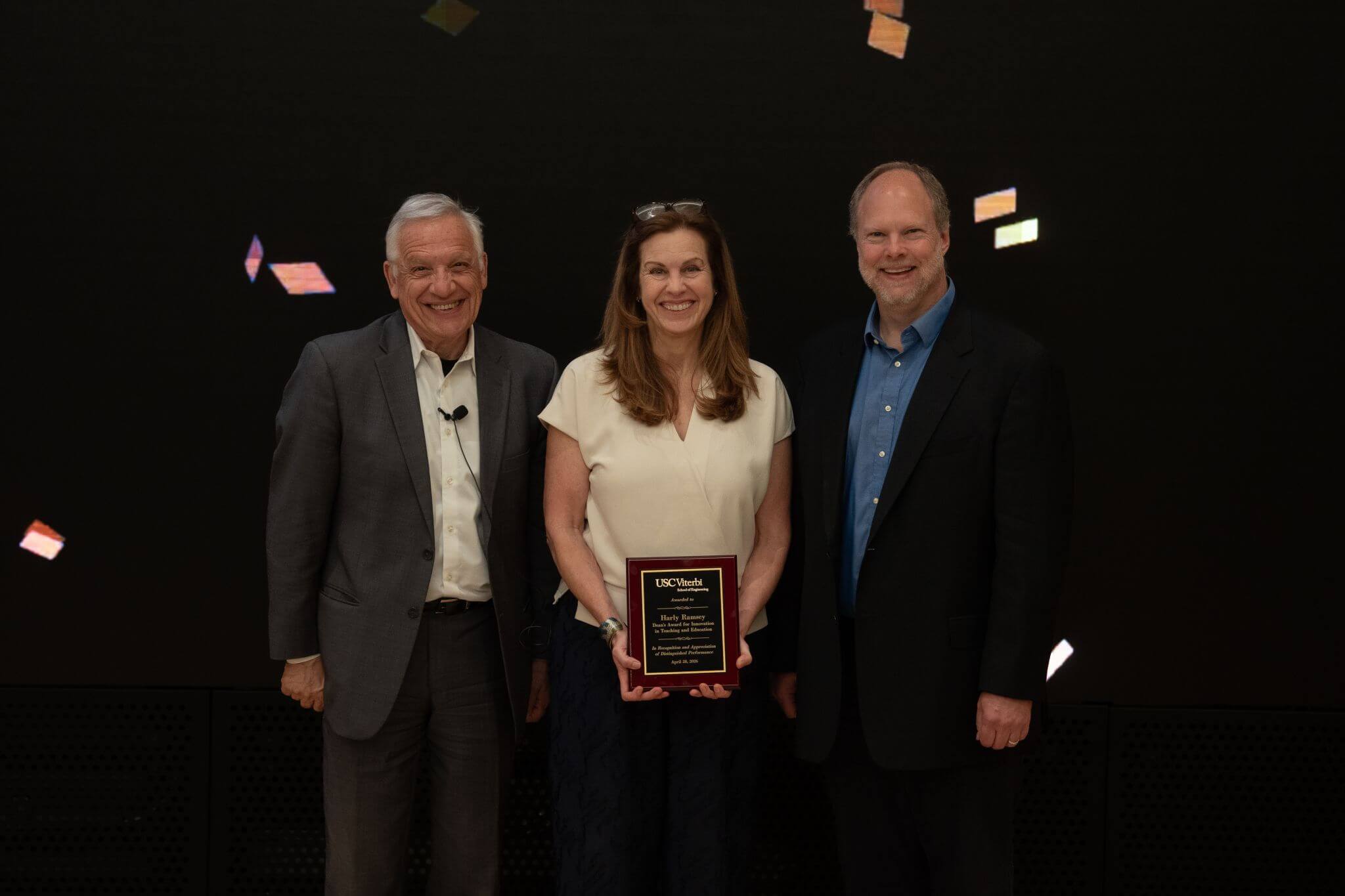 Dean Yannis C. Yortsos and Erik Johnson present the Dean’s Award for Innovation in Teaching and Education to Harly Ramsey